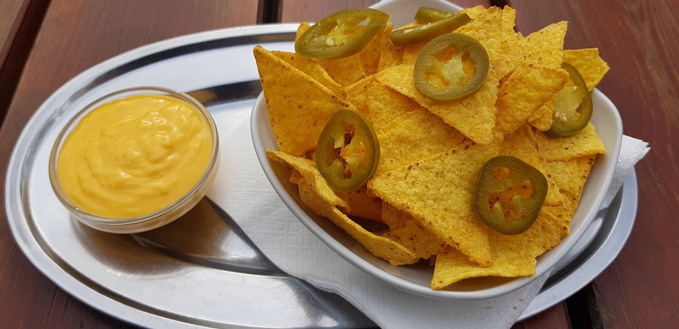 Nacho chips with jalapeno peppers